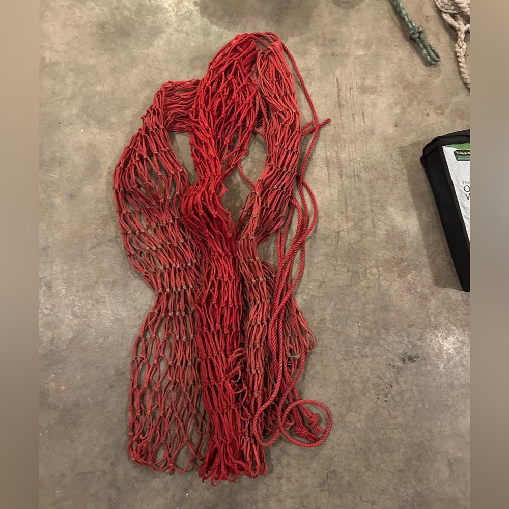 3 red hay bags